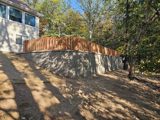 The wall and fence from the far corner